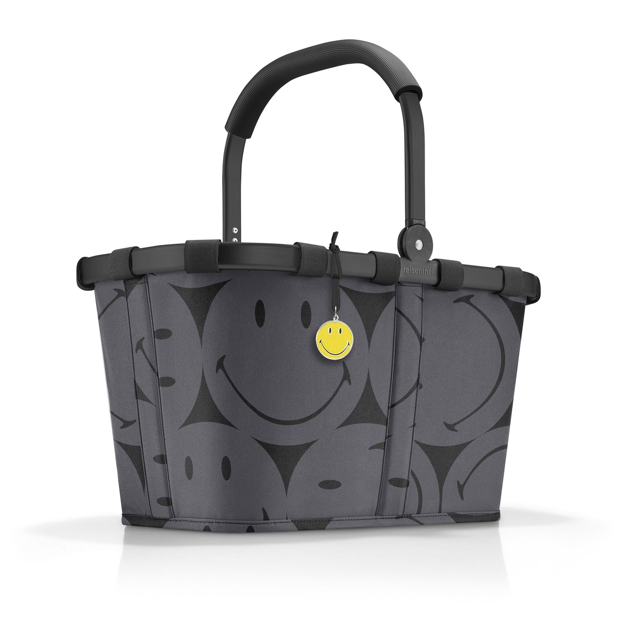 Shopping basket with black smiley faces and sturdy handle