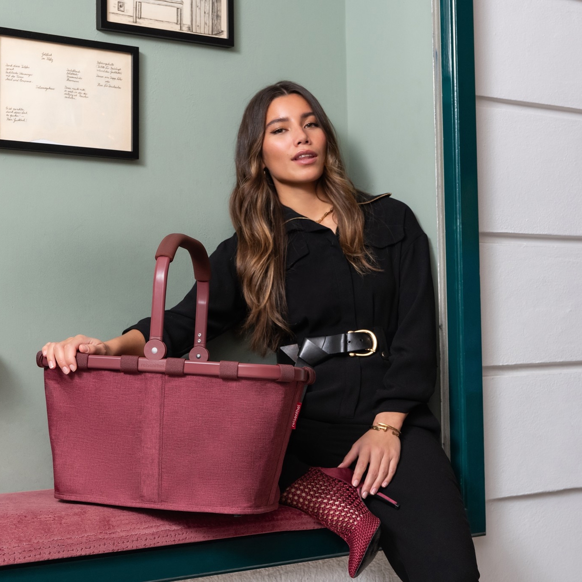 Woman with stylish red fabric shopping basket
