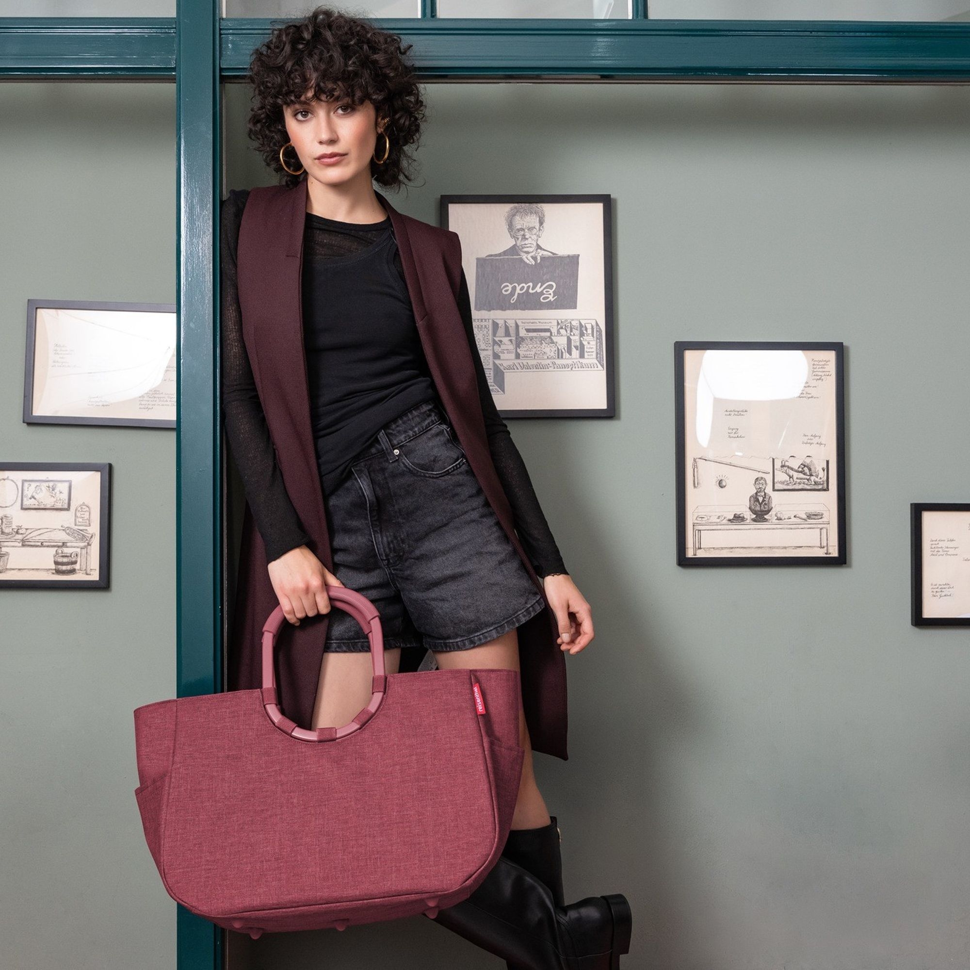 Woman with burgundy shopper bag