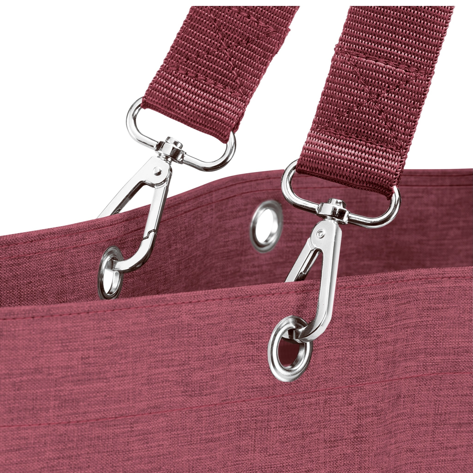 Handle detail with carabiners on burgundy bag