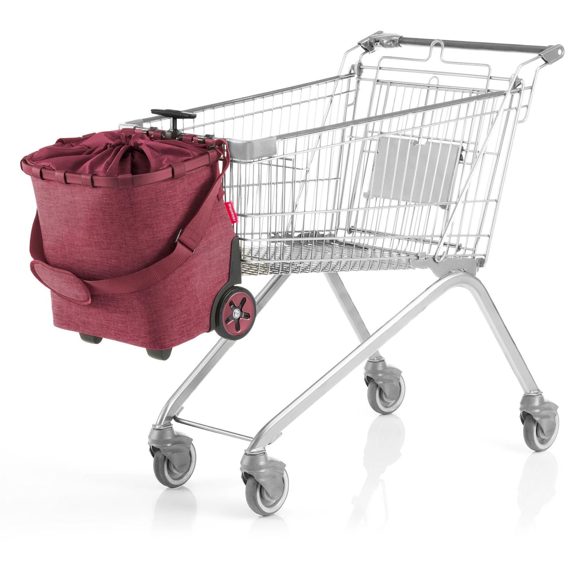 Red shopping trolley bag fixed to supermarket cart